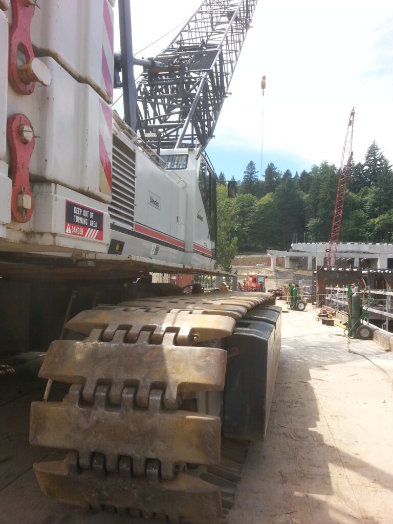 It’s easy to forget just how massive the equipment for this project is.  They don’t look as big when you drive past, but try getting up close to one of those cranes… they’re GIGANTIC!