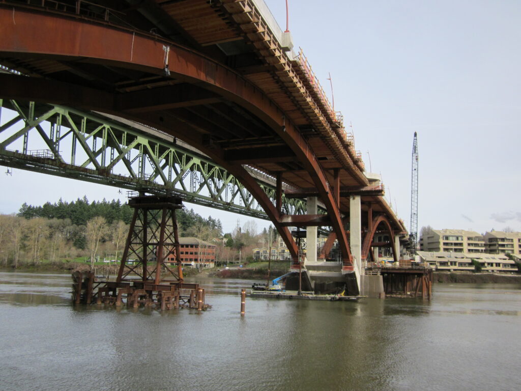 View under the middle arch from the west work bridge.