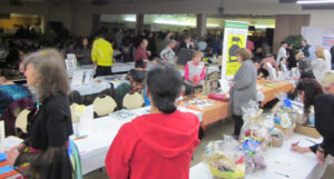 Community Tables and Silent Auc