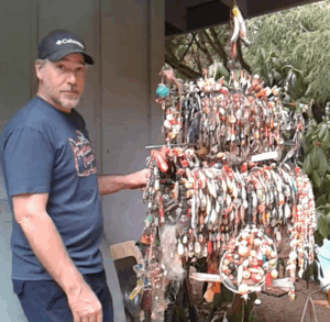 James Magmer displays his trashfishing collection
